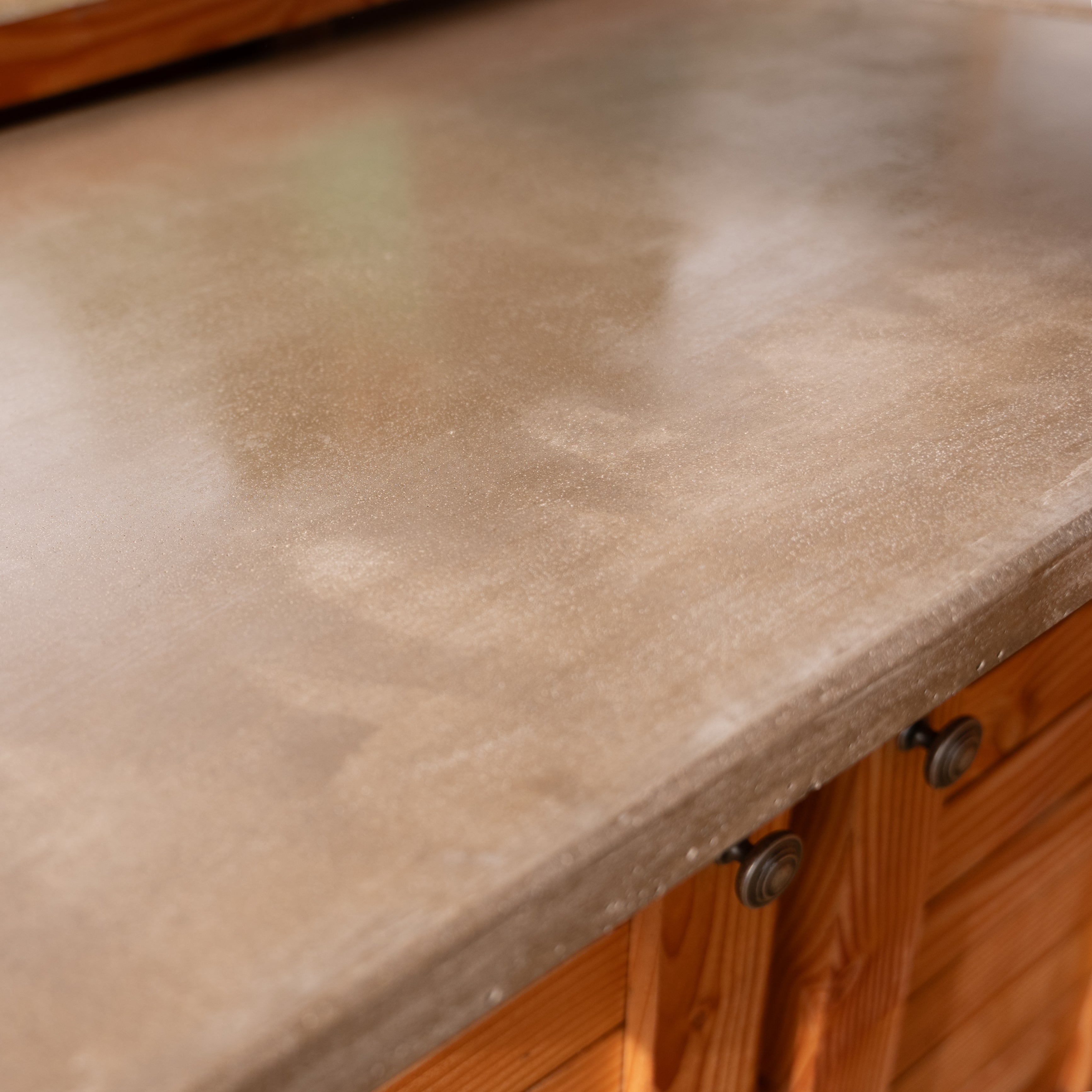 Outdoor Kitchen with Slatted Cabinets & Polished Concrete Worktop