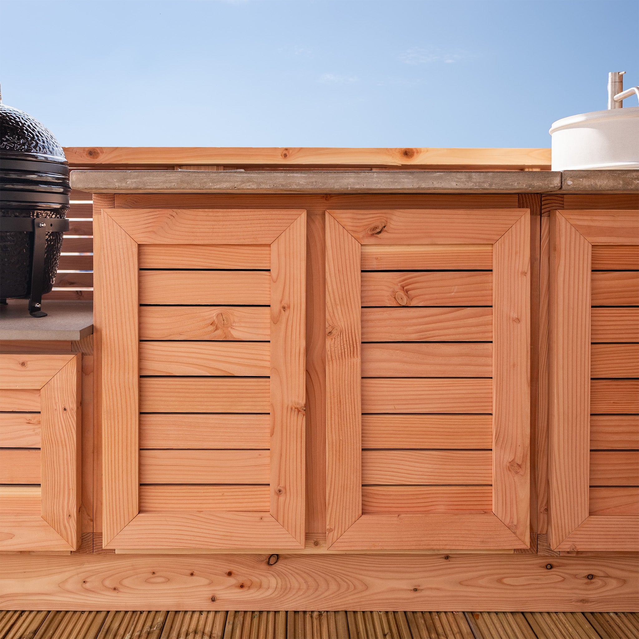 Outdoor Kitchen with Slatted Cabinets & Polished Concrete Worktop