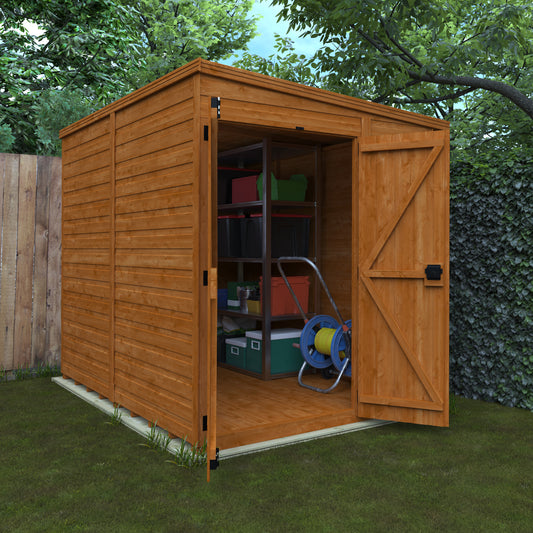 Brown Windowless Double Door Shed made out of wood, sitting on green grass next to a fence. The shed has metal racking inside and a wooden floor.